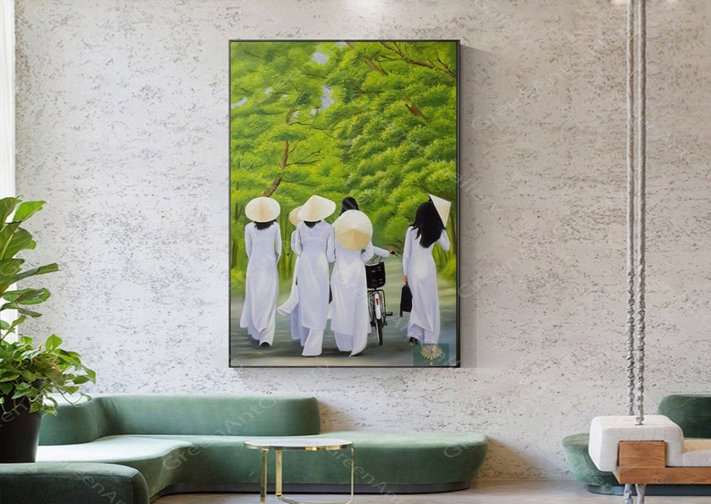 May include: A painting of four people wearing white ao dai dresses and traditional conical hats walking down a path lined with green trees.