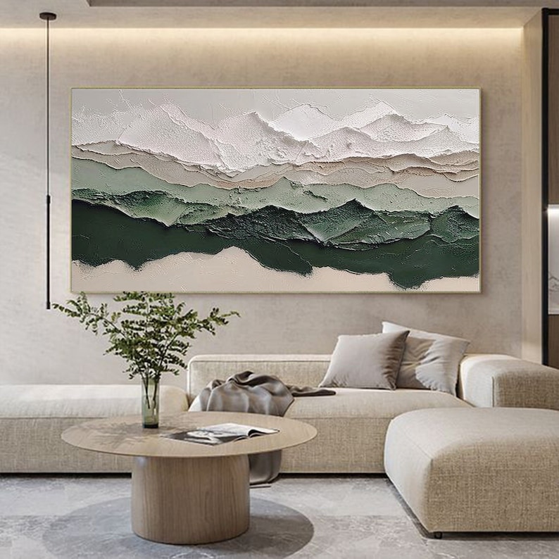 May include: Abstract landscape painting with white, green, and brown layers of paint. The painting has a textured, layered look, giving the impression of mountains.