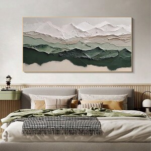 May include: Abstract landscape painting with white, green, and brown colors. The painting features a textured, layered effect, creating a sense of depth and dimension. The colors are muted and earthy, creating a calming and serene atmosphere.
