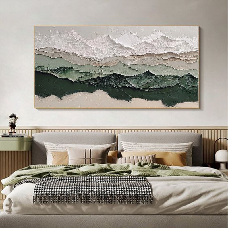 May include: Abstract landscape painting with white, green, and brown colors. The painting features a textured, layered effect, creating a sense of depth and dimension. The colors are muted and earthy, creating a calming and serene atmosphere.