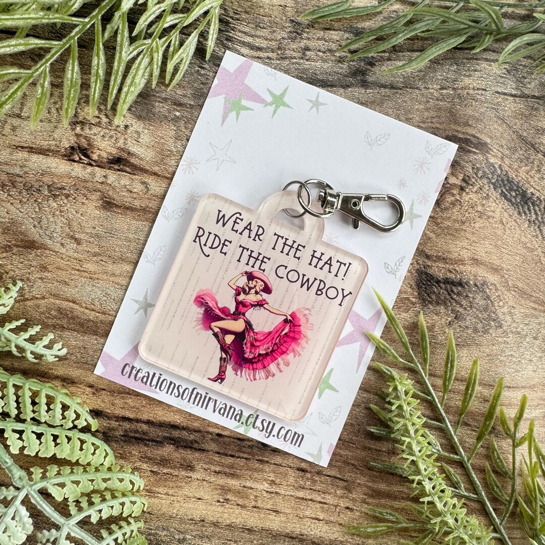 Wear the Hat, Ride the Cowboy Keyring. Gifts for Her. Bookmark. Keyring ...