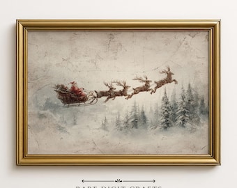 Puede incluir: Una impresión vintage enmarcada representa a Papá Noel en un trineo tirado por renos, volando sobre un bosque nevado. La obra de arte tiene un marco dorado y un aspecto envejecido. El texto "RARE DIGIT CRAFTS" está en la parte inferior.