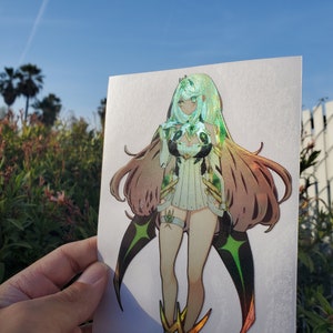May include: A sticker featuring a female anime character with long green hair, wearing a white and green outfit with gold accents. The character has a green and black star-shaped design on her legs and wings.