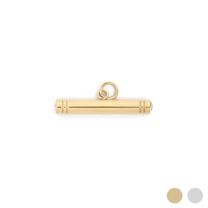 May include: A gold-colored, cylindrical pendant with a small loop at the top and a gemstone at each end. The pendant is a simple, elegant design, suitable for necklaces or other jewelry.