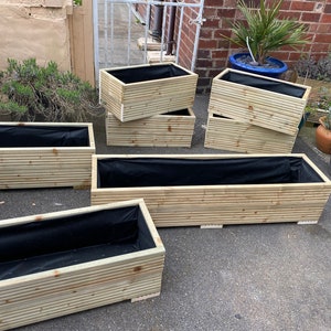 Ein kleiner Blumenkasten aus Holz - Pflanzschale aus 100% Baumwolle. Garten DIY. Pflanzentopf