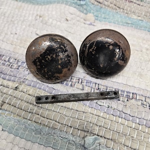 Pair of antique Chippy Black/Brown Metal Door Knobs Rusty Patina Salvage