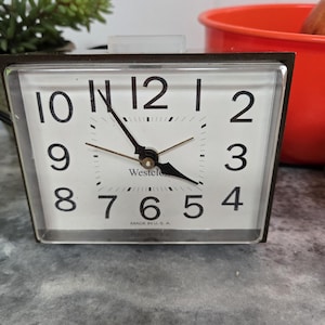 Vintage Westclox Desktop Analog Display Alarm Clock Faux Wood Grain