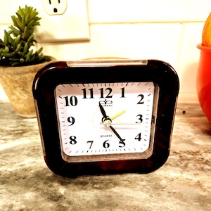 Vtg Red Tint Translucent Case Battery Alarm Clock by Ruiwang