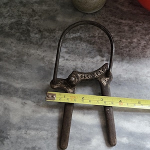 Vtg Stockland Canning Jar Opener and Lid Tightener    Cast Iron    circa 1920s   Minneapolis Mn