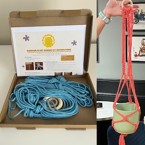 May include: A macrame plant hanger kit in a cardboard box containing blue cord and a wooden ring, alongside a finished coral-colored macrame plant hanger with a wooden ring holding a ribbed light green plant pot, with printed instructions.
