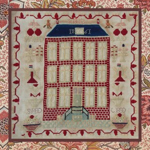 May include: A red brick house with a blue roof and white windows. The house is surrounded by a white frame with a red and white border. The date "1861" is embroidered on the roof.