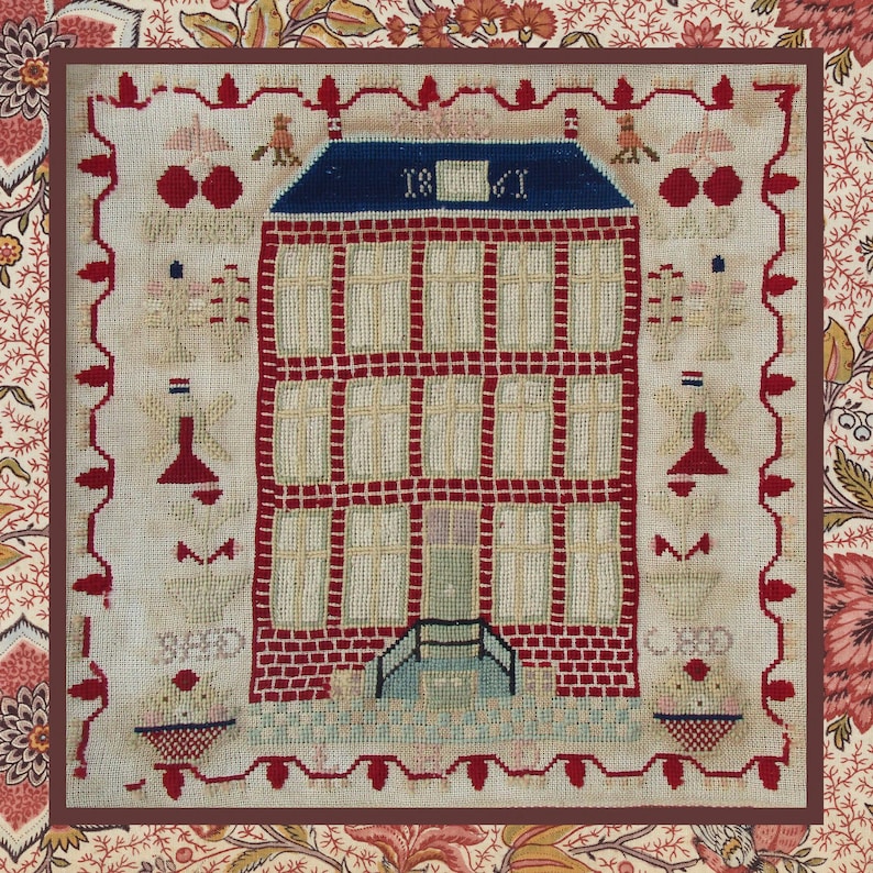 May include: A red brick house with a blue roof and white windows. The house is surrounded by a white frame with a red and white border. The date "1861" is embroidered on the roof.