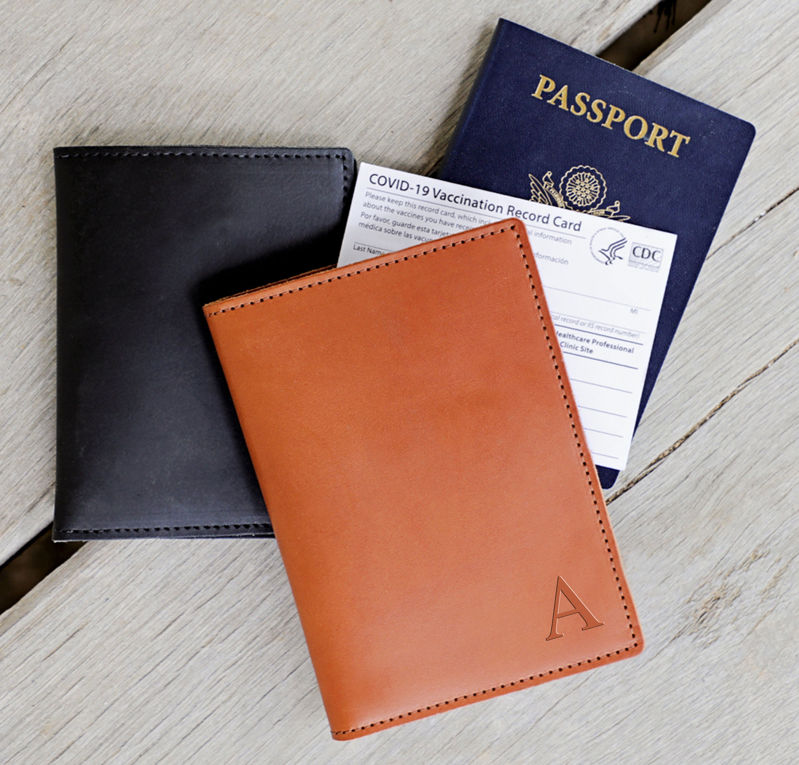 Monogram leather passport holder black – Totême