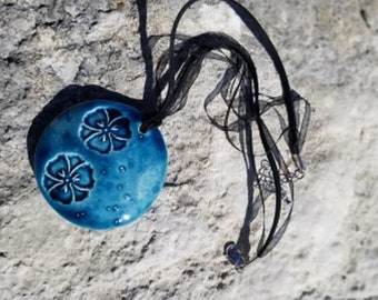 Ceramic flower pendant