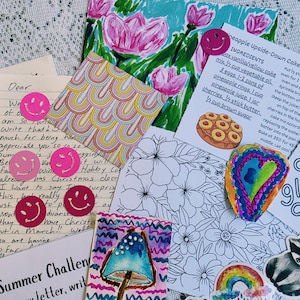 May include: A collection of stationery items including a handwritten letter, a recipe card for pineapple upside-down cake, a floral coloring page, a mushroom illustration, a raccoon sticker, and several small pink smiley face stickers.
