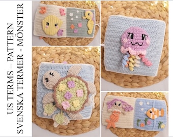 May include: A crochet baby book with different sea creatures on each page. The pages feature a yellow lemon, a seahorse, a turtle, a jellyfish, a mermaid, and a clownfish. The book is made with soft, colorful yarn and is perfect for little hands to explore.