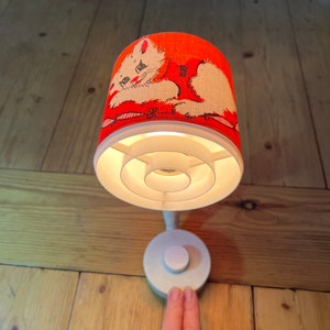 Lovely Elidus Wall Lamp in Orange with Cat Pattern, Type 9110 by Hans-Agne Jakobsson from 1970s. Bedside lamp, Hallway light, Entrance light