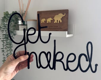 Knitted wire get naked sign