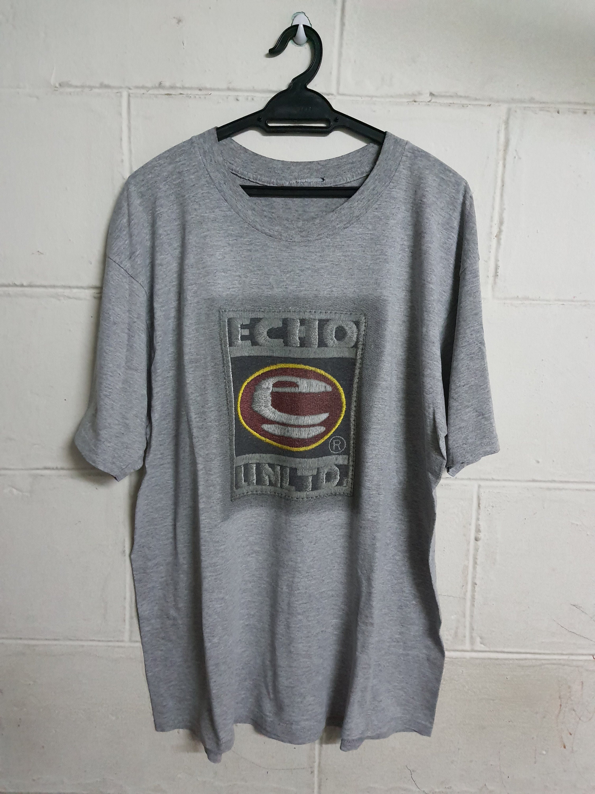 Vintage 90s Echo Unlimited Logo camiseta marca streetwear Marc Etsy