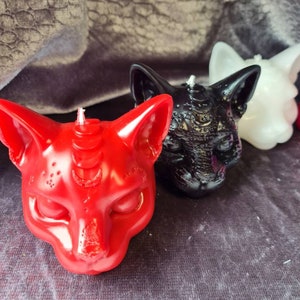 Cat with moon phases candle