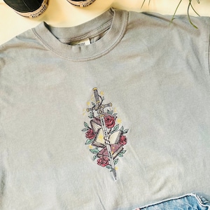 Embroidered Floral Fantasy Sword & Books Tee