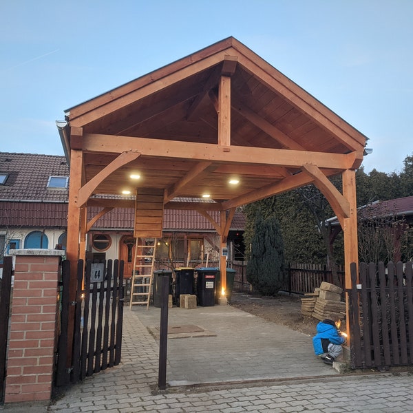 Single timber frame carport with a storage