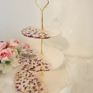 White and gold cupcake stand with real dried rose petals