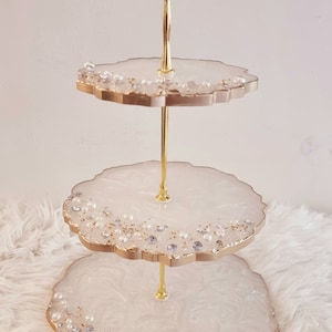 White and gold tiered cupcake stand with pearls and crystals