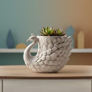 May include: A white swan-shaped planter with a textured feather design, holding two small succulents. The planter sits on a light brown wooden coffee table with a metal frame. The background features a gradient wall.