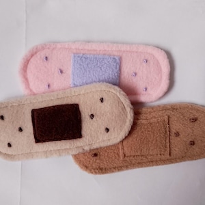Plush fursuit band-aid plaster prop
