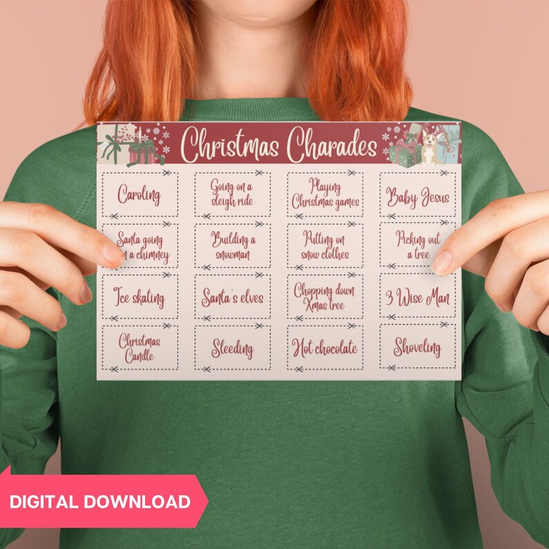 May include: A rectangular Christmas Charades game card with a maroon header and a pink background. The card features various Christmas-themed charade prompts like "Caroling" and "Santa going down a chimney". The words "DIGITAL DOWNLOAD" are at the bottom.