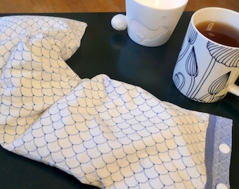 removable dry hot water bottle filled with organic flax seeds