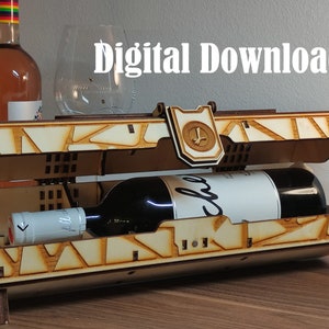 May include: A wooden wine bottle holder with a hinged lid, featuring a geometric pattern and a decorative metal latch. The holder is open, revealing a bottle of wine inside.