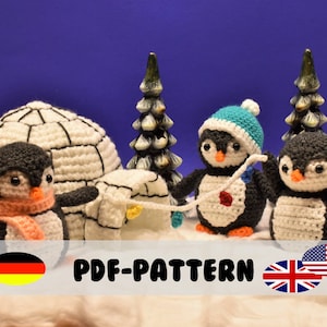 May include: Crochet penguin amigurumi pattern in English and German. The pattern includes three penguins, a white igloo, and a string of lights. The penguins are wearing hats and scarves. The pattern is available as a PDF download.