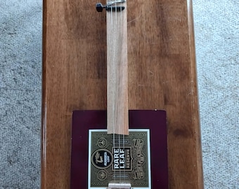 3 string electric cigar box guitar musical instrument