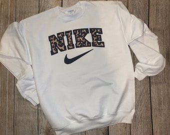 nike leopard jumper