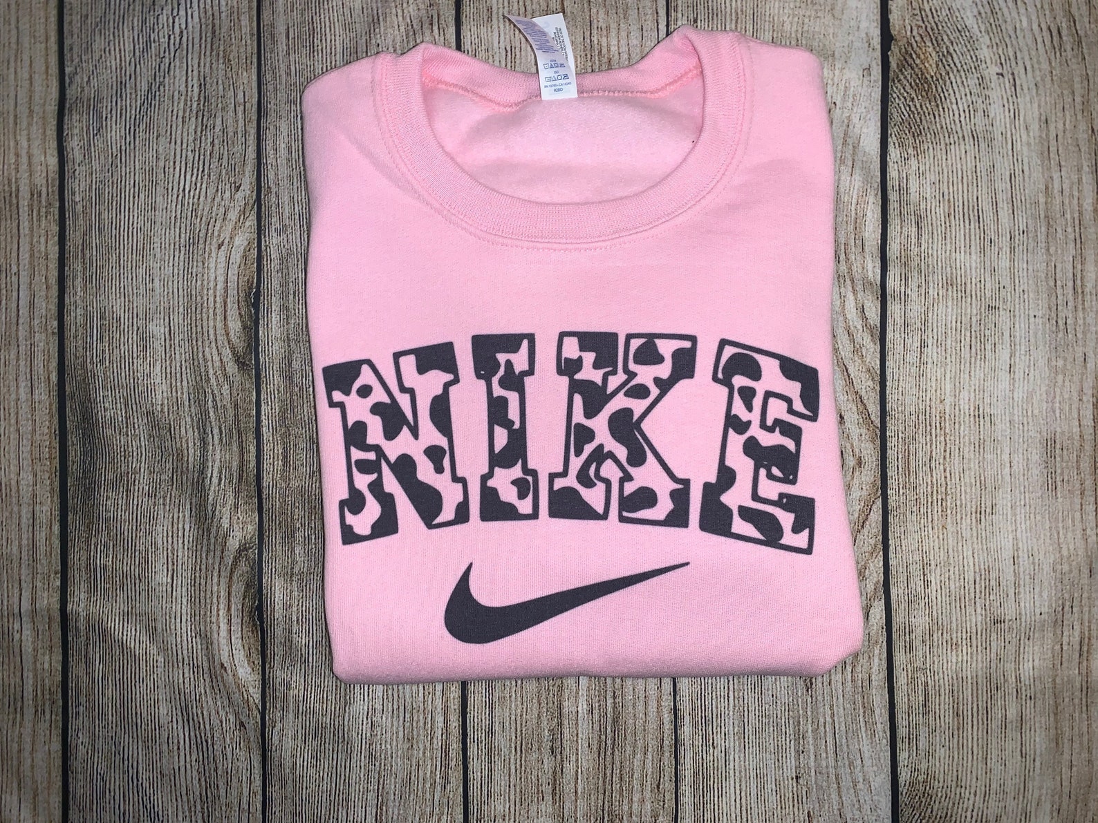 nike cow print embroidered sweatshirt