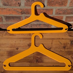 2 vintage coat hangers from the 70s, coat hangers yellow