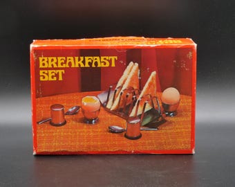 Breakfast set including egg cups, toast rack, salt and pepper shakers, 1970s NOS, vintage