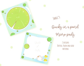 May include: Two designs of memo pads featuring a duck pond scene. One design has a green lily pad with the text "Shall we" and the other has a duck with the text "Shall we". Both designs have a blue and green background with white borders.