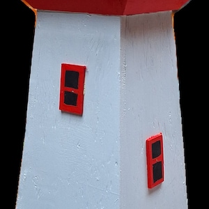 Solar lighthouse with Rotating Beacon 6 cm wide approximately 40 cm tall