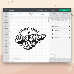 May include: Black and white graphic design with the text "Livin' That Dog Mom Life" in a retro font. The design includes a paw print, stars, and the words "Dog Mom Life" in a circle.