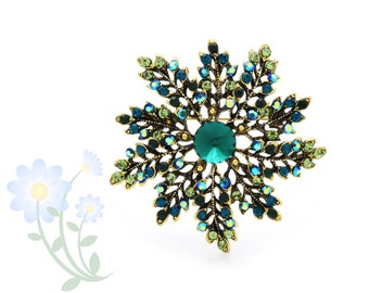 Broches de copo de nieve de diamantes de imitación verde para mujeres Belleza Flor Party Broche de oficina Pin Regalos