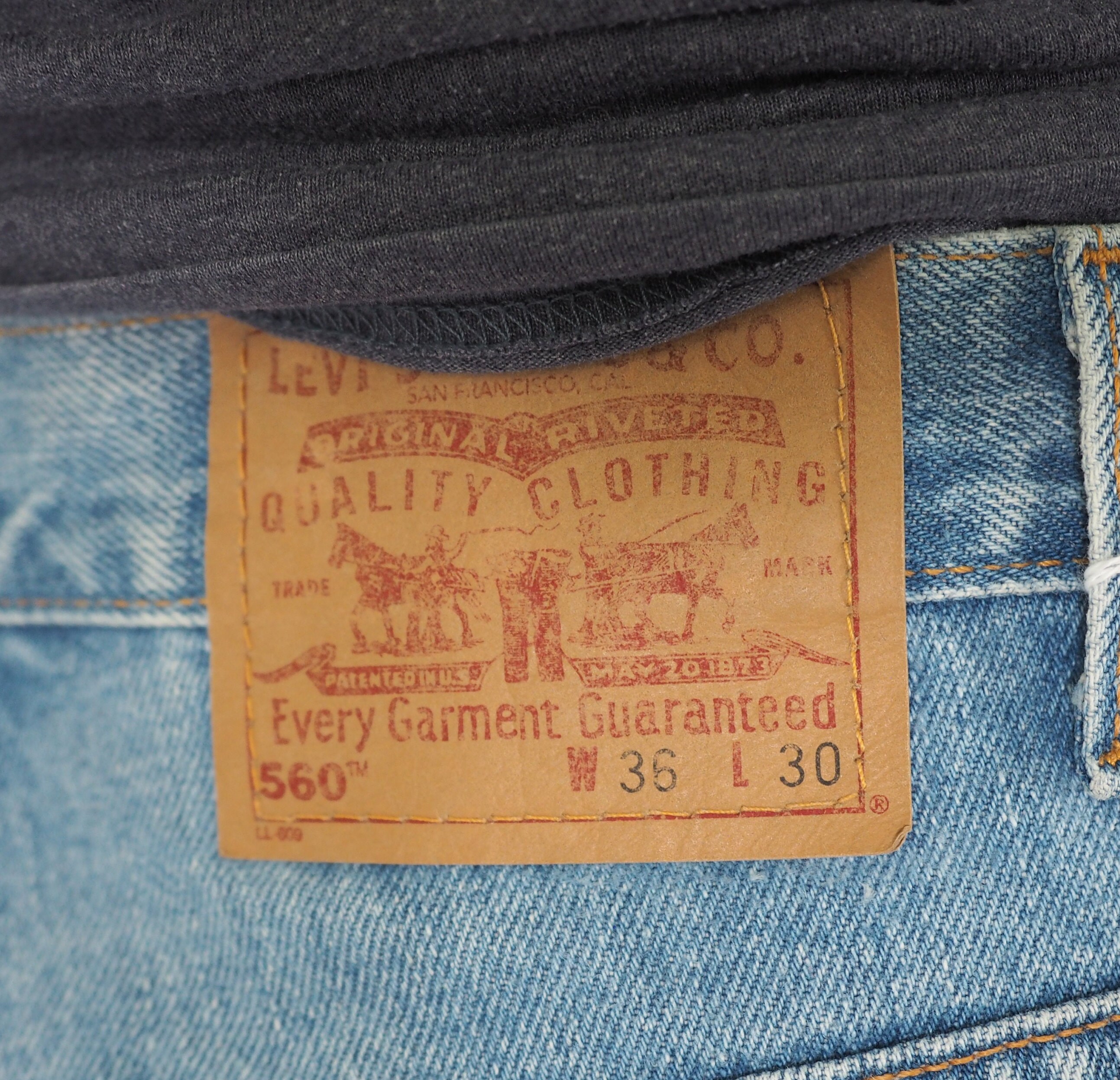 Distressed Vintage Levi 560 Jeans | High Waisted | Tapered Distressed Vintage Levi 560 Jeans | High Waisted | Tapered