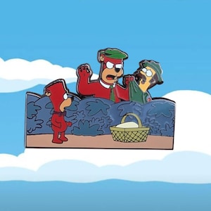 May include: A colourful enamel pin depicting a cartoon scene with a picnic basket. The pin shows a red bear, a ranger, and another red bear. The background is blue with white clouds.
