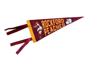 Rockford Peaches 1940s antique-inspired championship mini pennant, 4 x 8.75, burgundy and gold felt, 2-color printing.