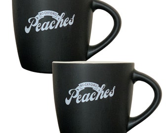 Set of two, Rockford Peaches 10 oz. black ceramic mugs with double-sided logo in giftable boxes.