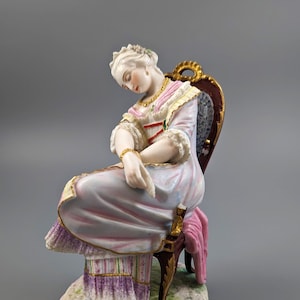 A 19th century Vion et Baury Paris biscuit porcelain figurine of a lady sleeping