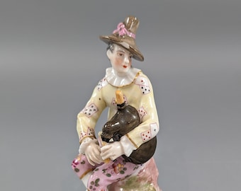 Porcelaine de Paris, Marx Eugene Clauss, Harlequin playing the bagpipe