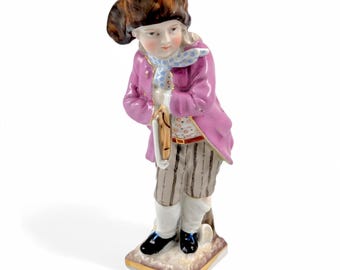 Sitzendorf antique porcelain "Skater" figurine hand-painted on gilt base, Germany, c. 1880s